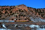 UP 5282, 6420, 2573 (C45ACCTE, C44AC, ET44AH)lead an eastbound empty hopper train [a monster] at Castle Rock, Utah. February 19, 2022 {Winter Echofest}
